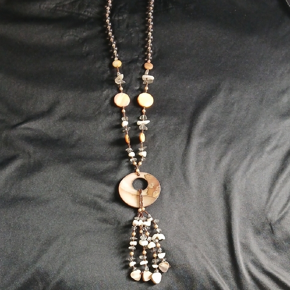 Jewelry - Elegant Beaded Necklace with Circular Pendant